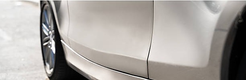 Vehicle dent before repair